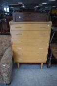 A vintage light teak six drawer bedroom chest, width approx. 78cm, height 119cm