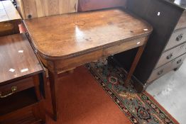 A 19th Century mahogany fold over tea table, width approx. 96cm