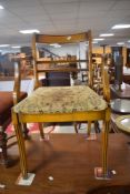 A reproduction yew wood carver chair