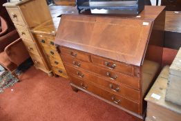 A reproduction regency yew effect bureau, width approx. 91cm