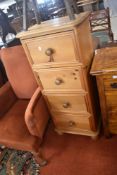 A modern natural pine chest of four drawers, height approx. 112cm