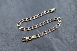 A 9ct gold flat curb link bracelet, approx 180mm long & 3.7g