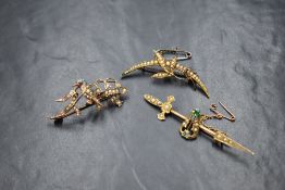 A 15ct gold seed pearl set foliate brooch, the pearl set leaf motif entwined with a pearl set