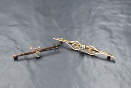 A 15ct gold aquamarine and pearl set bar brooch, the central old cut aquamarine flanked by split