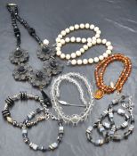 A selection of costume jewellery including Baltic amber necklace with 9ct gold clasp, vintage