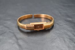 An 18ct gold Solgal wristwatch, the golden rectangular dial having Arabic and dot numerals, on an