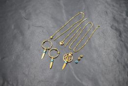 A 9ct gold feather dream catcher motif suite, comprising a broken necklace and hoop earrings, the