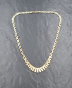 A 9ct gold necklace, the graduated articulated rectangular panels having decorative texture to the