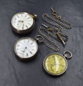 A group of three silver open face pocket watches, two having Roman numerals and one having Arabic,