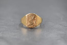 A 9ct gold signet ring, the rectangular panel having 'PC' monogram and scroll engraving, marked 375,