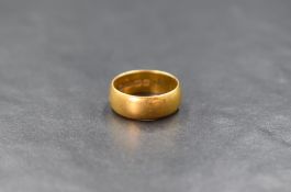 A 22ct gold wedding band of plain broad form, size J & approx 5.3g