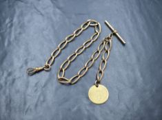 A 9ct gold curb link watch chain, having a dog clip, T-bar and a Georgian gold guinea coin attached,