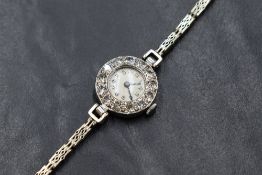 An Art deco platinum & diamond mechanical cocktail watch with 9ct white gold bracelet strap, the