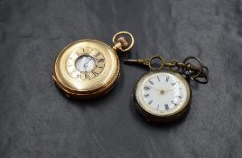 A gold plated top wound Half Hunter pocket watch having a Roman numeral dial with subsidiary seconds