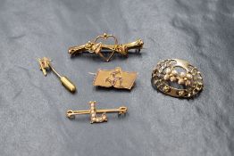 A 9ct gold bar brooch, the openwork heart having vine decoration to the stem motif bar, marked