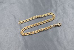 A 9ct gold double curb link bracelet, 18.5cm, 3.4g