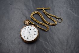 A gold plated top wound open face Waltham pocket watch, the white dial having Roman numerals and