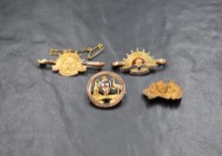 A group of four 9ct gold Australian brooches, two of the Australian coat of arms and two for the