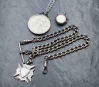 An Elizabeth II 1977 silver jubilee coin, in a silver pressure mount on a white metal chain, along