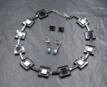 A Coeur De Lion necklace, of black and clear square beads interspersed with black and silver