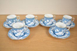 A set of six 20th-century Royal Crown Derby porcelain celadon blue coffee cans and saucers, each