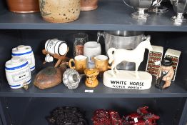 A mixed lot of 20th-century Breweriana, featuring a Royal Doulton Winston Churchill Toby jug, a