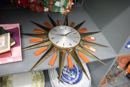 A vintage Metamec Sun/starburst wall clock, with battery operated movement 62cm