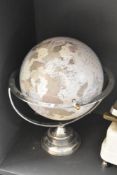 A 20th century chrome globe having internal light, h42cm