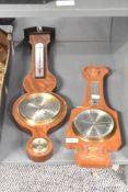 Two 20th-century Comitti of London mahogany banjo barometers, comprising a larger wheel barometer