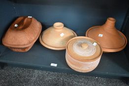 A large 20th-century West German Romertopf decorated clay pot with lid, sold with three natural clay