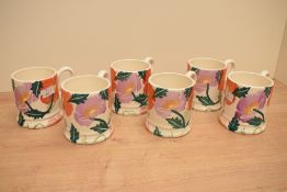 A group of six Emma Bridgewater pottery Bright Poppies pattern mugs, printed marks to base 10cm