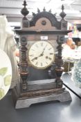 A late 19th Century mantel clock having Roman numeral hour dial to chapter ring and single