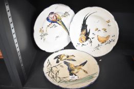 A group of 3 Gien Grands Oiseaux dinner plate decorated with flying geese, w27cm, and pheasants, (