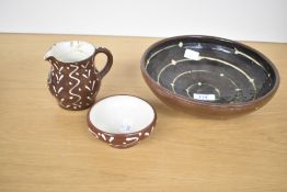 A late 20th-century studio art slip glazed pottery bowl, having a concentric circular pattern of