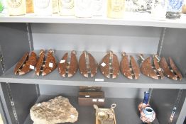 Four pairs of 20th-century Bakelite Shoe Stretchers, marked made in England, three size 9-10 and one