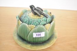 A 20th-century Thomas Forester, Majolica glazed ceramic Bird and Artichoke butter dish, featuring