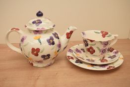 An Emma Bridgewater pottery oversized trio and teapot, decorated in the Wallflower pattern with