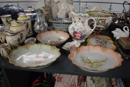 A collection of 20th-century decorative bone chinaware, including three French Limoges porcelain