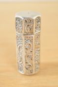 A Victorian Hallmarked Silver scent bottle, highly decorative Victorian flower design with a