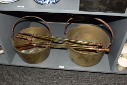 Two large heavy gauge brass jam pans, of tradition design with iron over-handles, sold together with