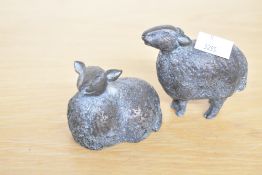 Two contemporary Deborah Scaldwell Slipcast terracotta decorative 'standing' and 'sitting' sheep,