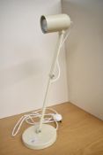 A modern Ikea TOLFT steel desktop work lamp, in the colour beige, 57cm at full extension.