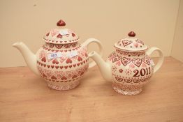 Two Emma Bridgewater Sampler pattern with pink hearts teapots, one marked 2011, largest 19cm