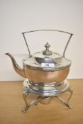 A late 20th-century silver plated spirit kettle on a stand with burner, 25.5cm.