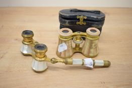 A pair of gilt metal and Mother-of-pearl moungted opera glasses, manufactured by Le Maire Paris