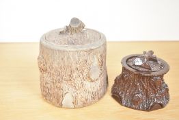 Two late 20th-century tobacco jars, both featuring a log finial and tree stump textured design, both