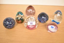 A selection of 7 late-20th century-modern Art Glass paperweights, unmarked.