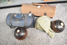 A collection of seven 20th-century crown green bowls, including a set of two Taylor bowls in the