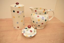 An Emma bridgewater pottery polka dot pattern milk jug and lidded cylindrical biscuit barrel,