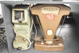An Avery class C weighing machine, h46cm, sold together with an Avery Shadoweight weighting scale
